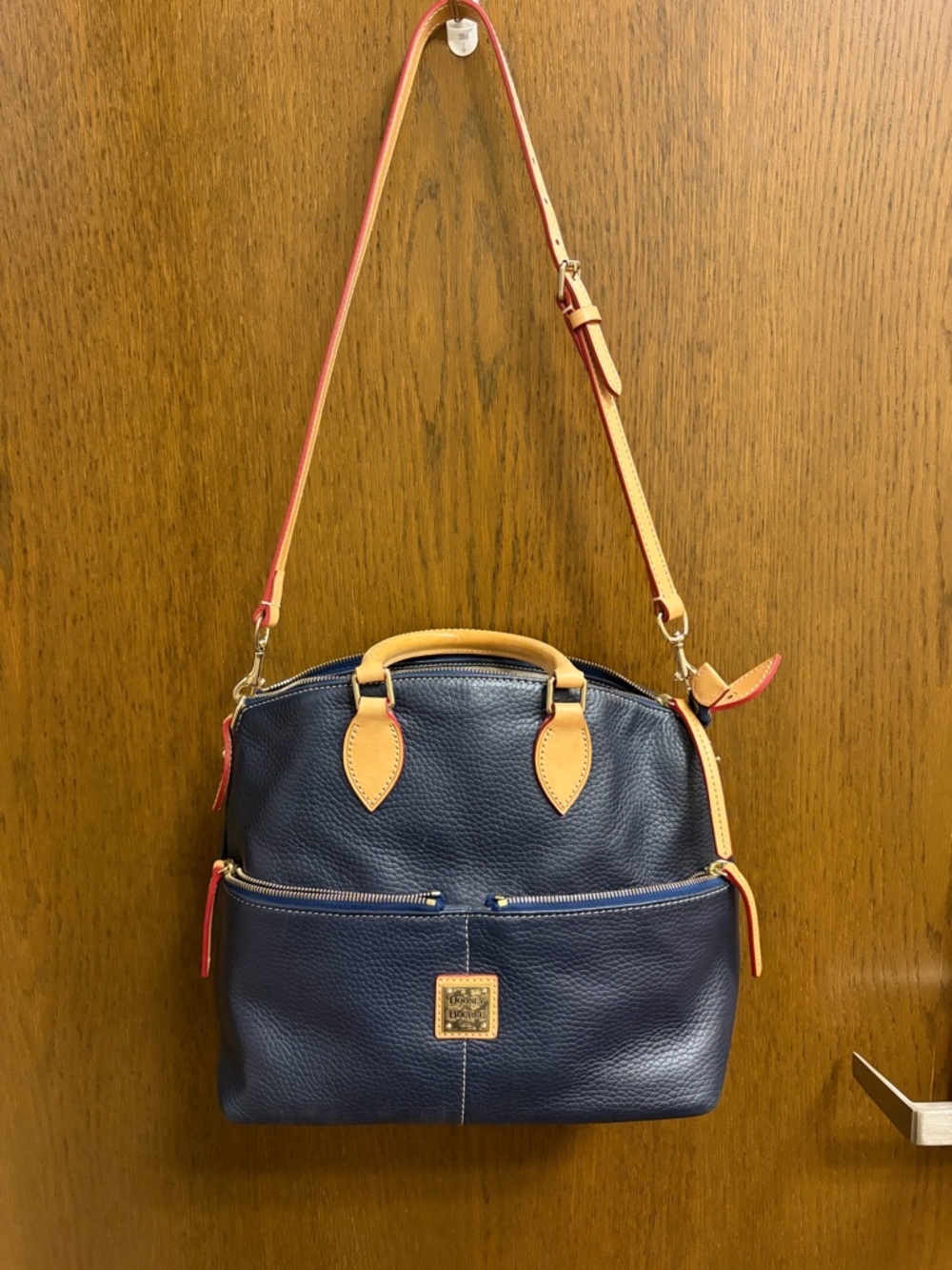 Dooney & Bourke Navy Pebble Leather Satchel with Tan Trim and Red Accents